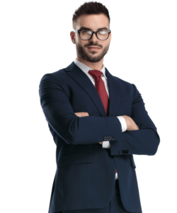 Młody mężczyzna ubrany w garnitur z krawatem z założonymi rękami